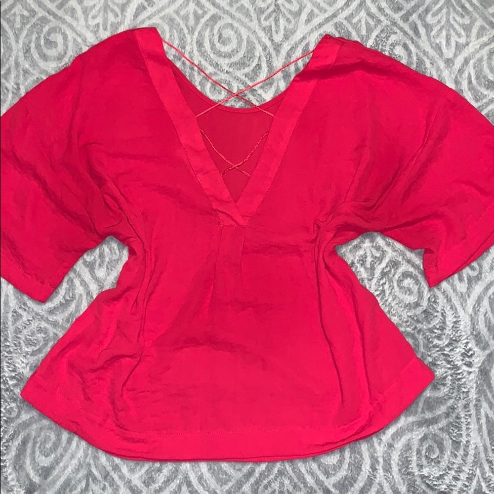 Cute red top with criss cross back!